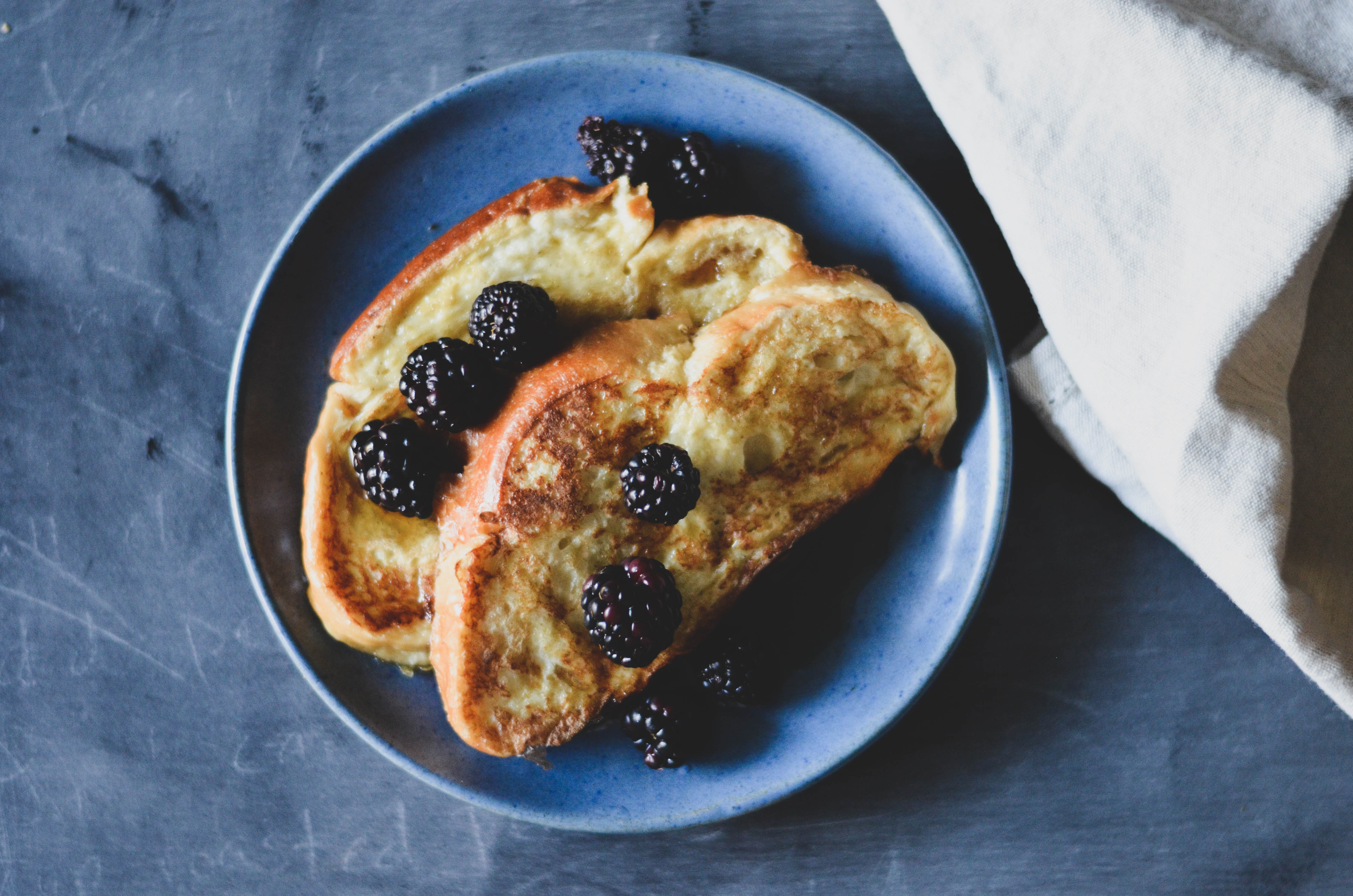 https://honeycreekkitchen.com/orange-scented-challah-french-toast/challah-french-toast-7/