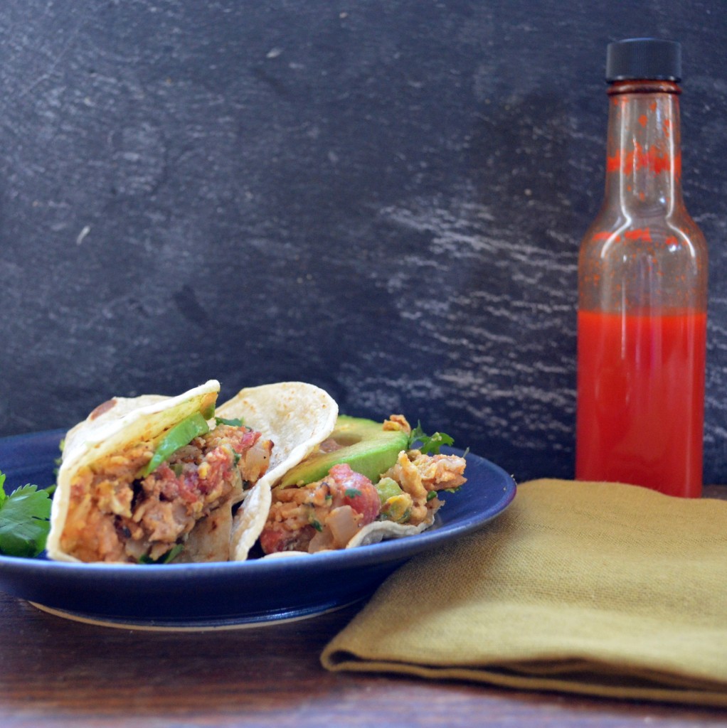 Migas breakfast tacos with habanero hot sauce